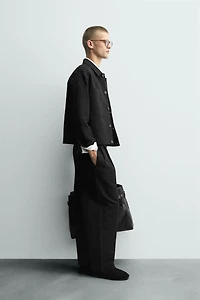 RELAXED FIT PLEATED PANTS