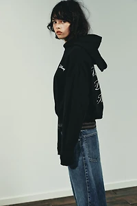 ©DISNEY TEXT SWEATSHIRT