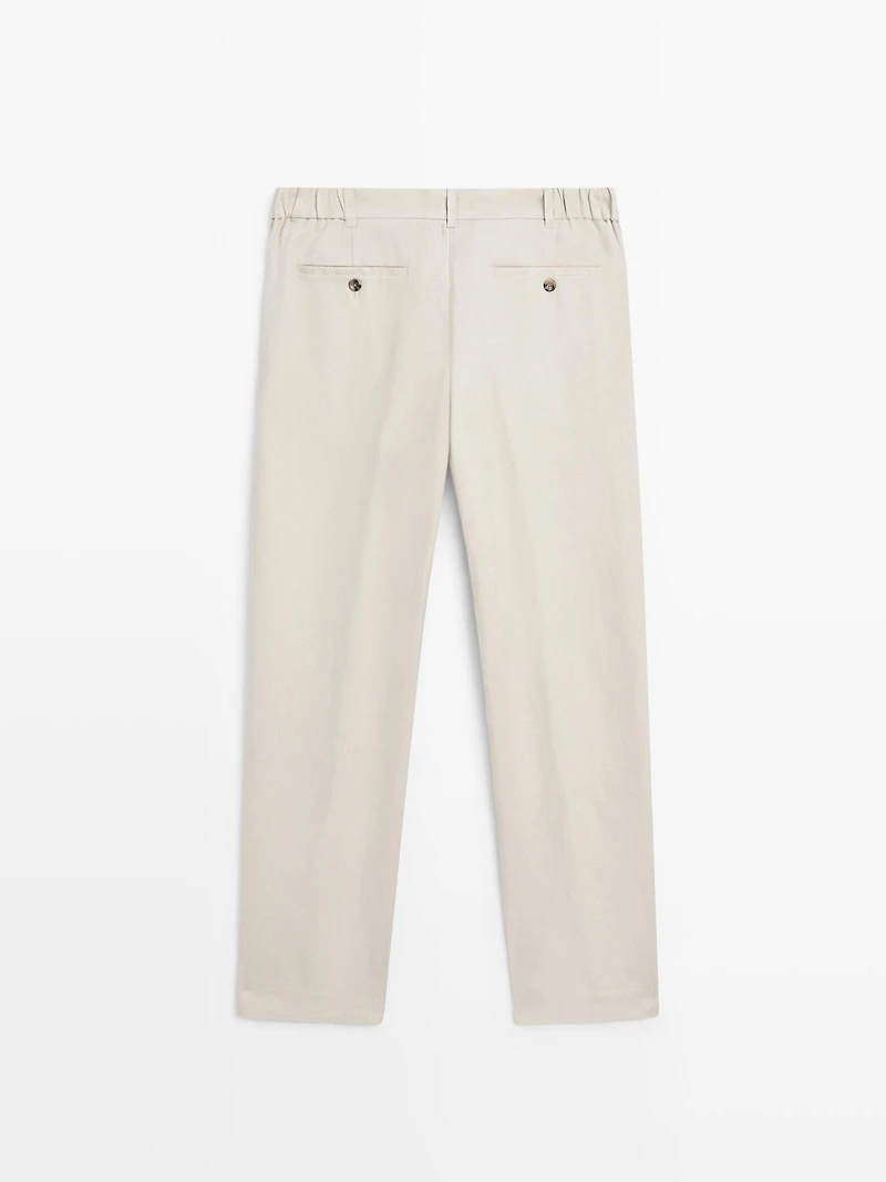 Tapered fit linen trousers