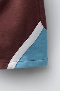 SHORT EN MOLLETON AVEC DÉCOUPES