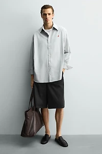 GATHERED OPEN-BACK LOAFERS