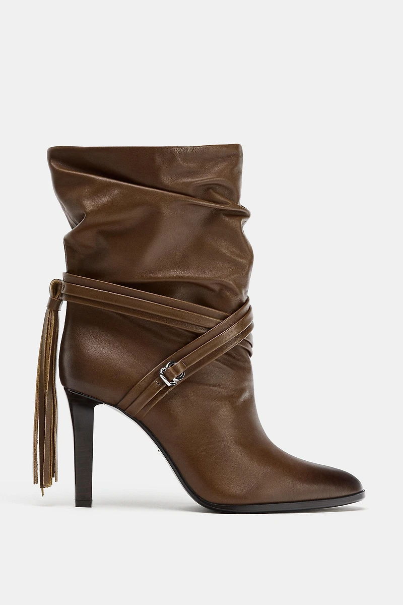 FRINGED LEATHER ANKLE BOOTS