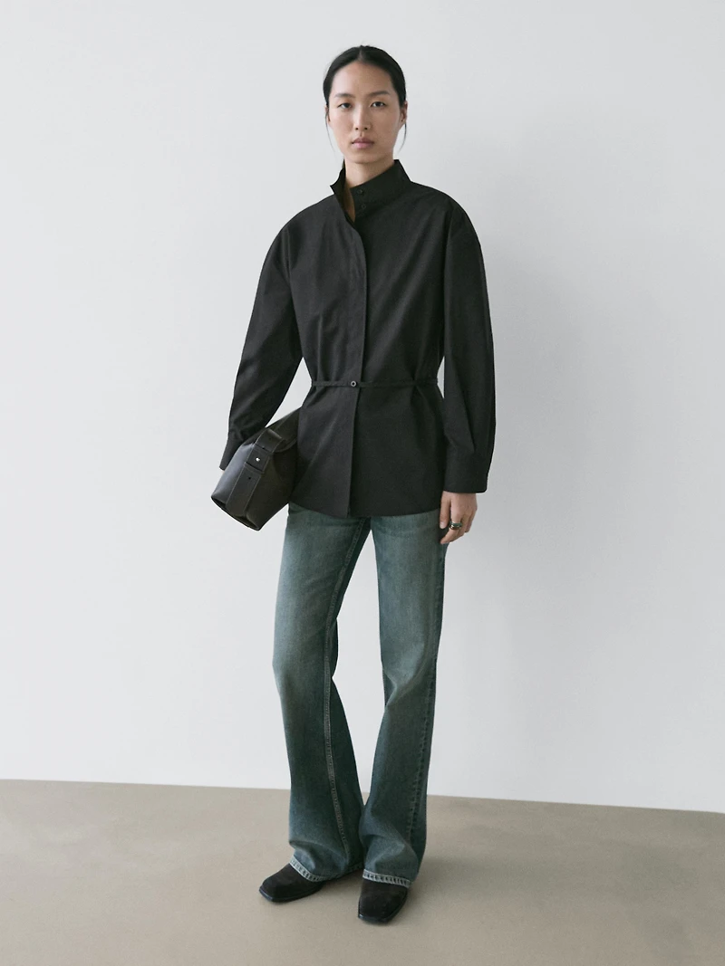 High neck shirt with strap detail