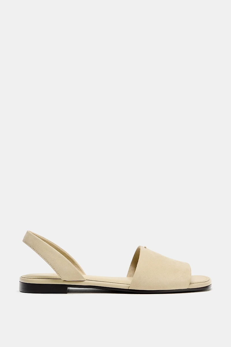 SANDALES PLATES EN CUIR À BRIDES