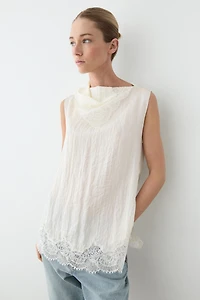Asymmetric roll neck top with lace detail