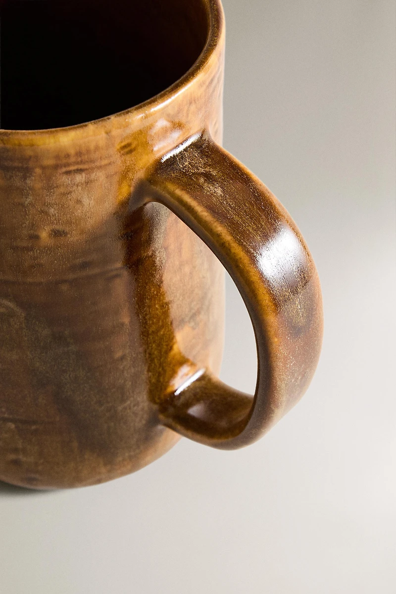 BROWN STONEWARE PITCHER
