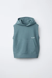 HOODED PLUSH TEXT VEST