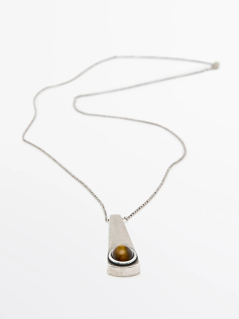 Geometric pendant with stone
