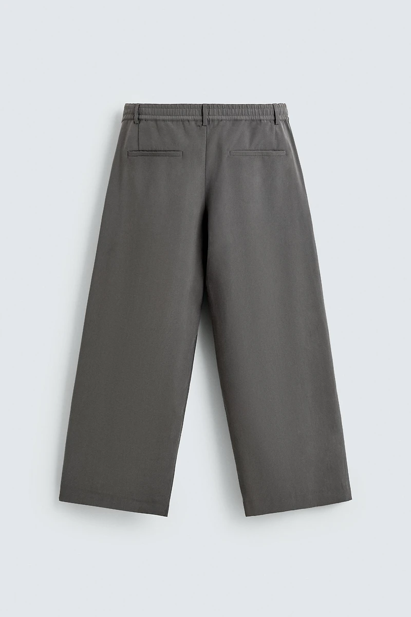 FLOWY PLEATED PANTS