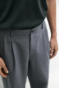 Pantalon relaxed fit à pinces en laine froide