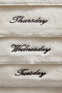 PACK OF COTTON HAND TOWELS WITH DAYS OF THE WEEK (PACK OF 7)