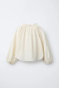 BLOUSE À CLOUS