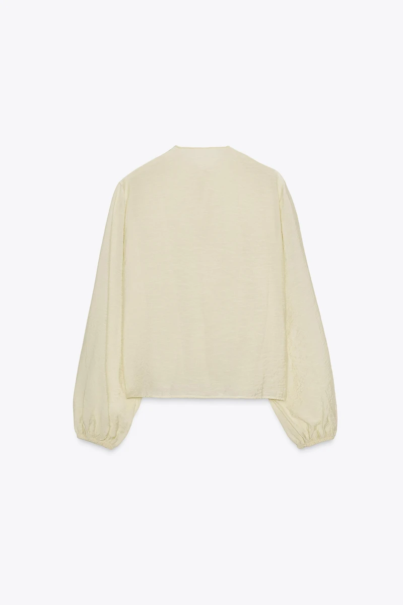 BLOUSE ROMANTIQUE À VOLANTS