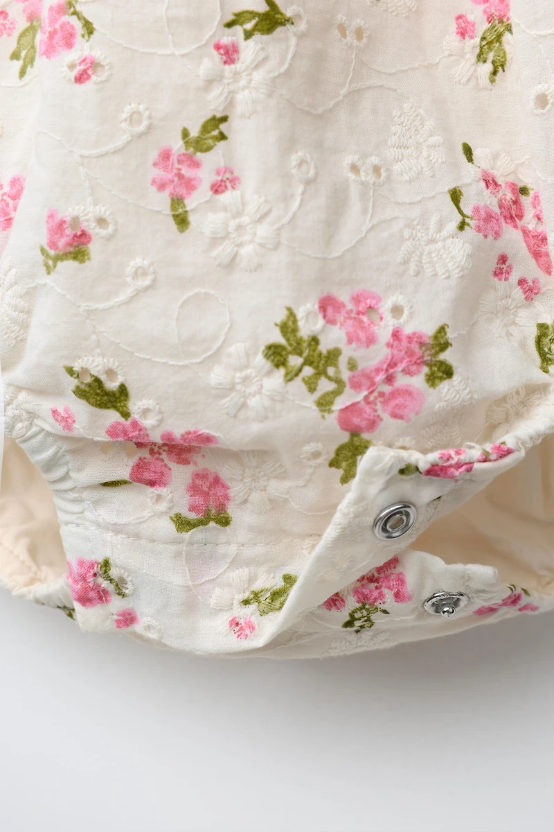FLORAL EYELET ROMPER