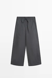 Cropped technical barrel fit pants