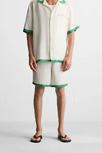 SATIN SHORTS WITH CONTRAST STRIPES