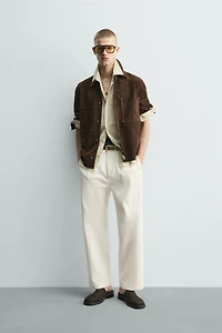 PLEATED WIDE FIT CHINO PANTS