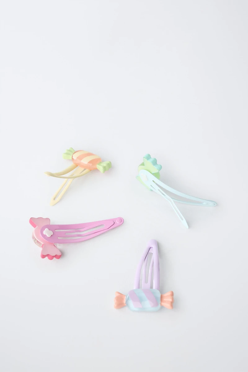 LOT DE QUATRE PINCES BONBONS