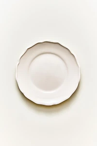 ASSIETTE À PAIN FAÏENCE BORD RELIEF