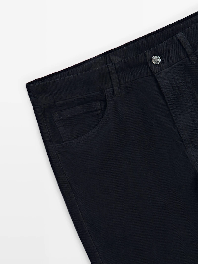 Faux jean en velours côtelé coupe slim
