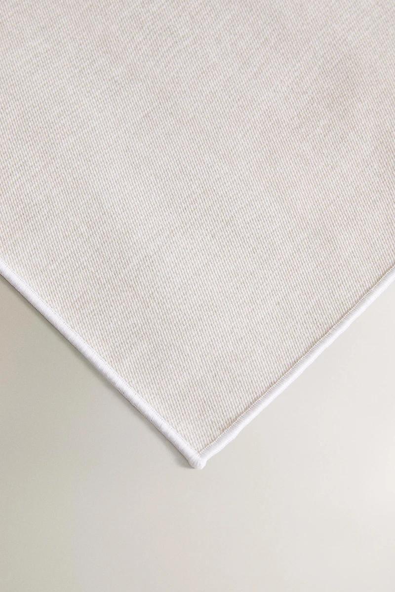 RESIN-COATED OVERLOCK PLACEMAT