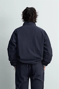 LIGHTWEIGHT TECHNICAL JACKET