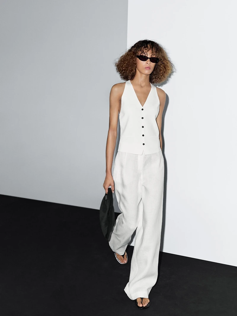 Knit waistcoat with contrast buttons