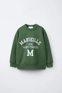 RAISED TEXT SWEATSHIRT