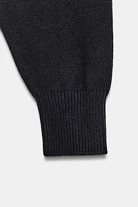 PULL COURT EN MAILLE UNIE