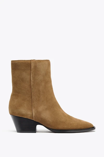 BOTTINES À TALONS EN CROÛTE DE CUIR