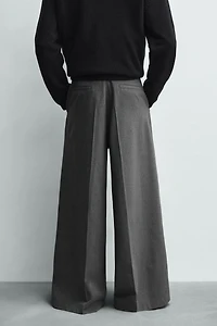 PANTALON COUPE LARGE À PLIS
