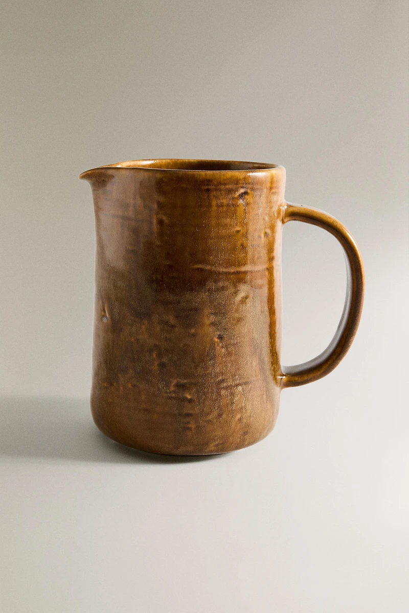 BROWN STONEWARE PITCHER