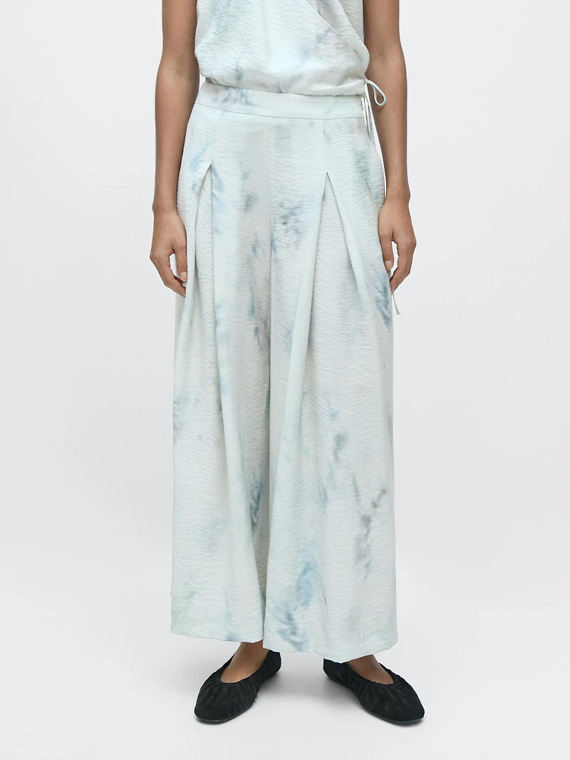 Printed trousers with pleat details