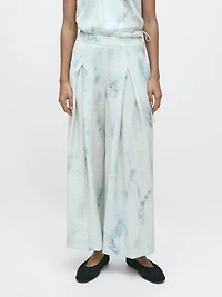 Printed trousers with pleat details