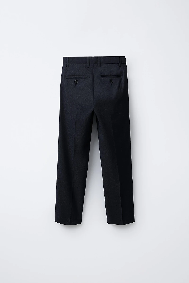 TEXTURED SUIT PANTS