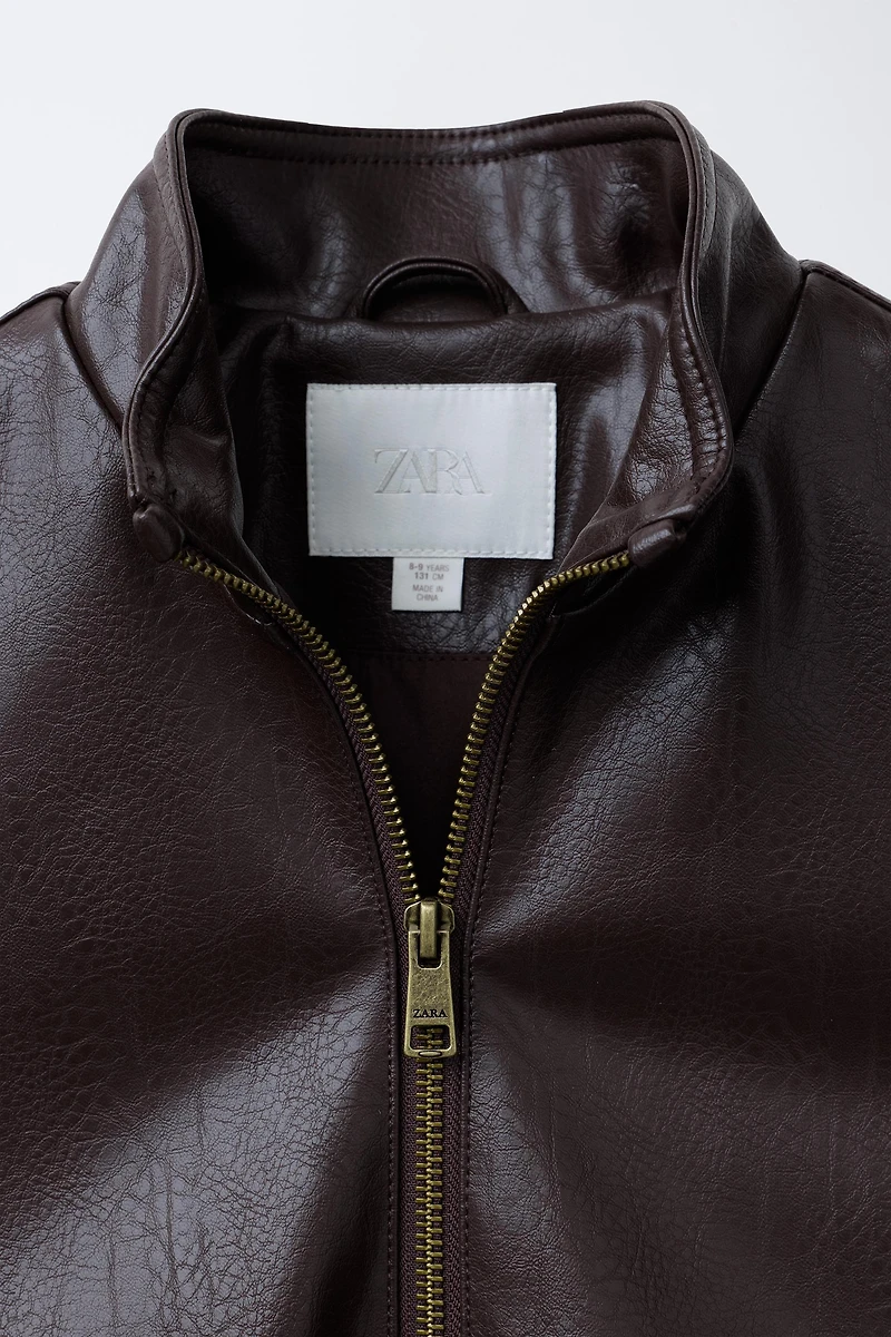 BLOUSON EN MATIÈRE SYNTHÉTIQUE