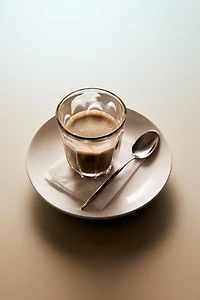 COFFEE TUMBLER WITH RAISED DESIGN