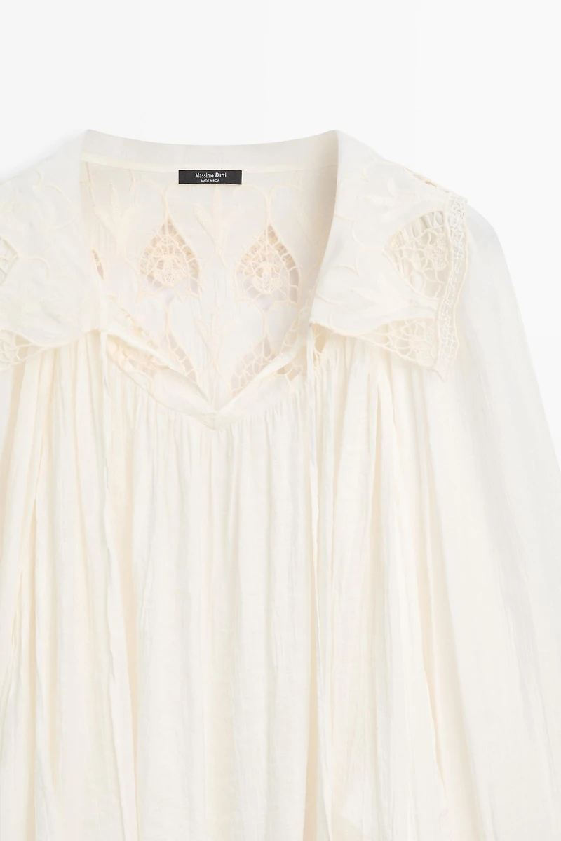 Embroidered flowing blouse