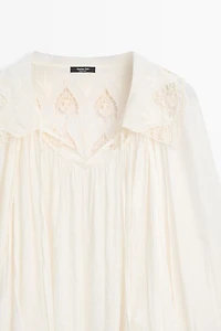 Embroidered flowing blouse