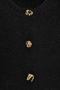 GILET EN MAILLE À ÉPAULES MARQUÉES