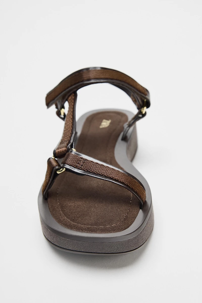 STRAPPY ADHESIVE SANDALS