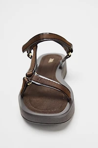 STRAPPY ADHESIVE SANDALS