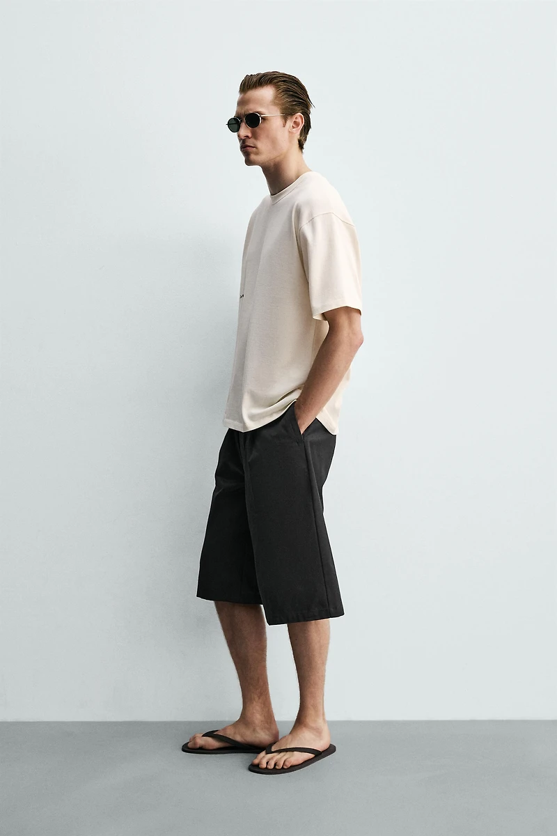 CONTRASTING PATCH TEXT T-SHIRT