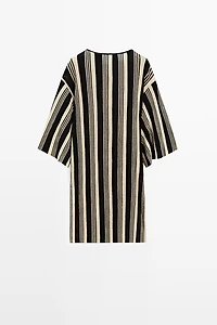 Pull en maille style tunique rayé