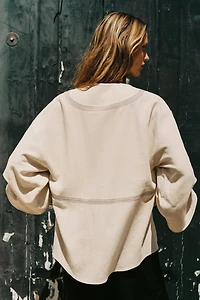 CHEMISE OVERSIZE EN LIN À SURPIQÛRES CONTRASTÉES