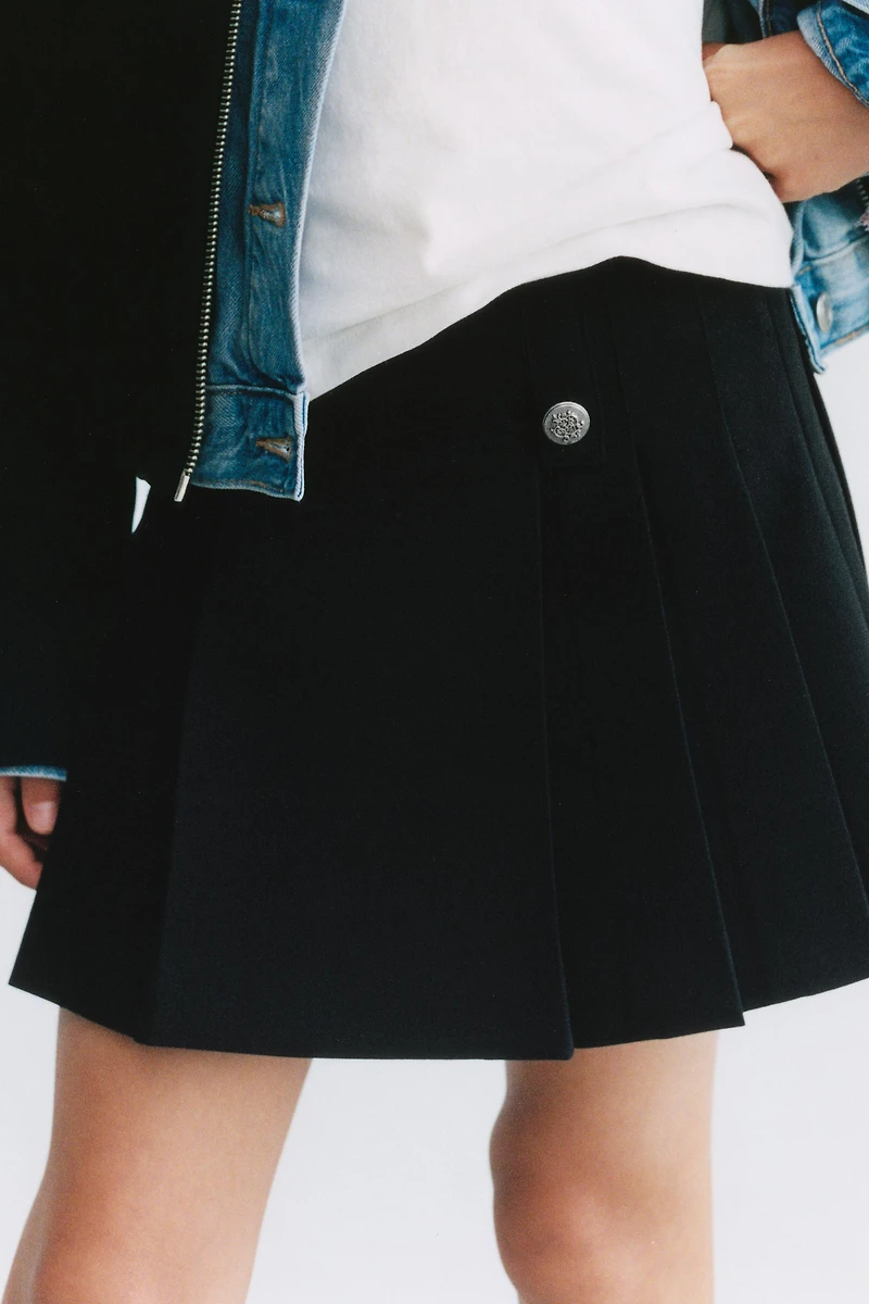 BUTTONED PLEATED SKIRT
