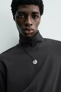 T-SHIRT À COL CHEMINÉE