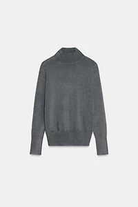 PULL EN MAILLE AVEC BOUTONS