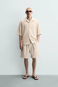 RELAXED FIT EMBOSSED SHORTS