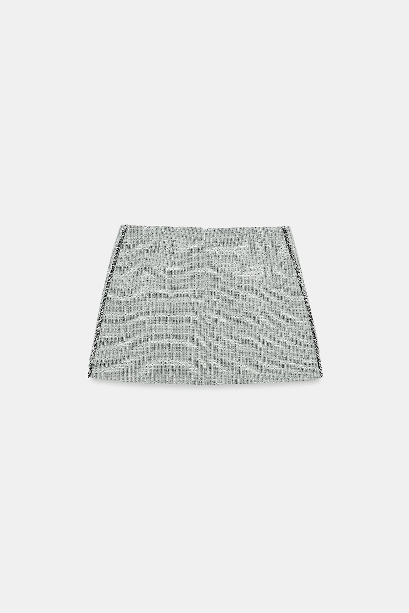 TEXTURED FRAYED MINI SKIRT